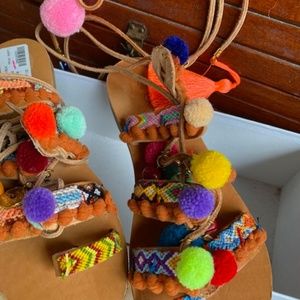 Elina Linardaki lace up to knee sandal